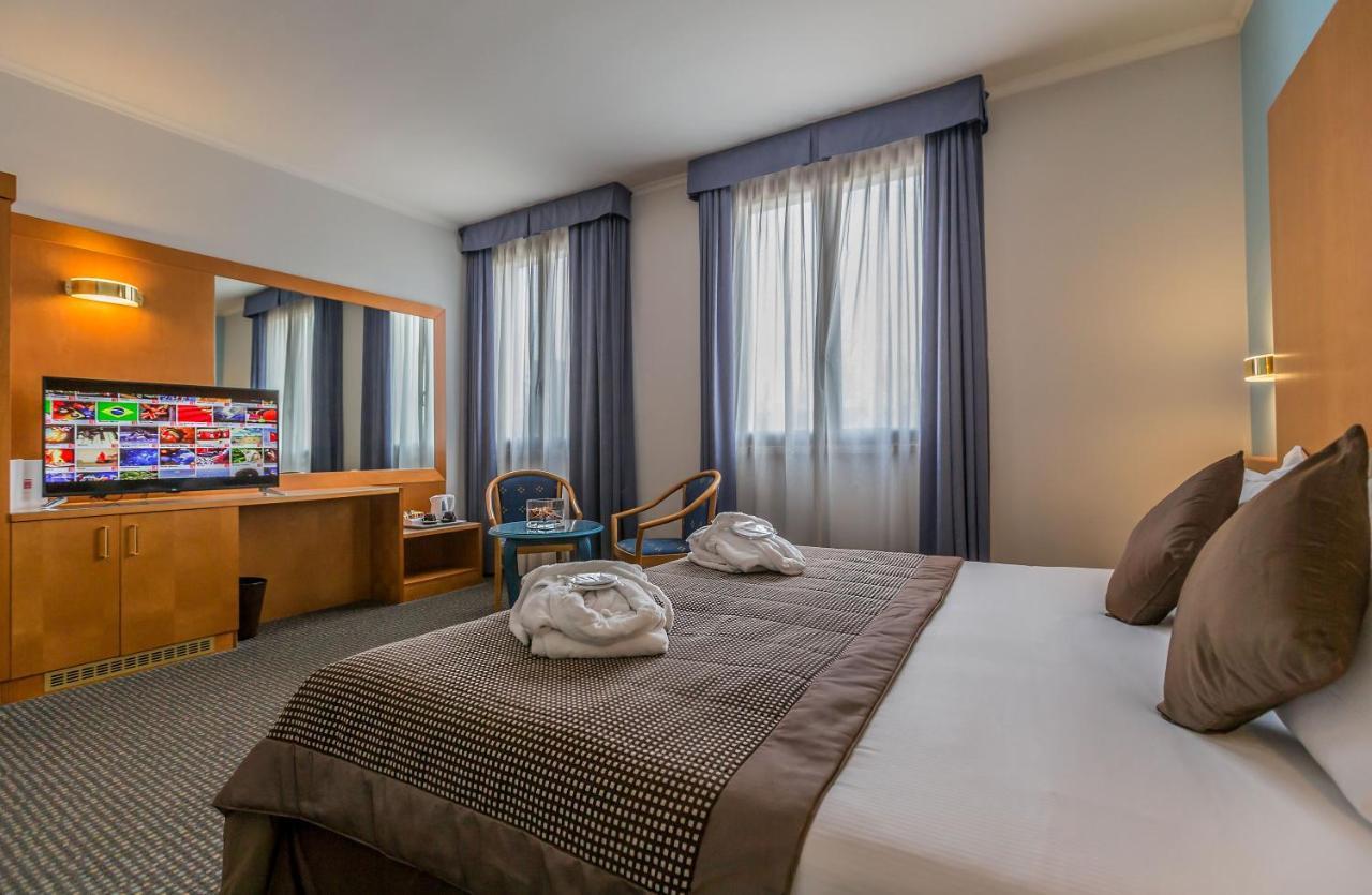 Una Hotels Occhiobello Bagian luar foto
